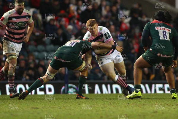 270118 - Leicester Tigers v Cardiff Blues - Anglo-Welsh Cup - Round 3 -  Rhys Carre of Cardiff Blues is tackled by Sam Lewis of Leicester Tigers 