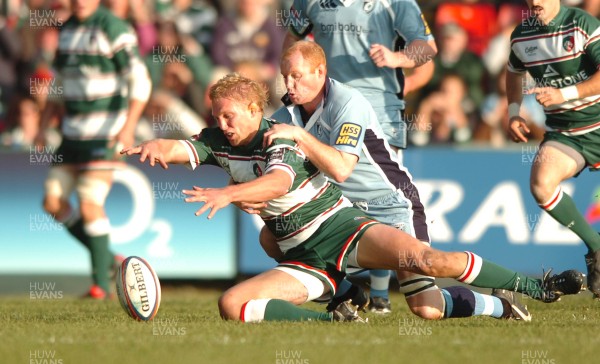 03.11.07 - Leicester Tigers v Cardiff Blues - EDF Energy Cup - Leicester's Lewis Moody is tackled by by Martyn Williams 