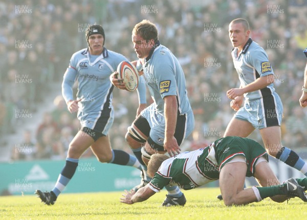 03.11.07 Leicester Tigers v Cardiff Blues... Cardiff's Xavier Rush beats tackle b Leicester's Lewis Moody 