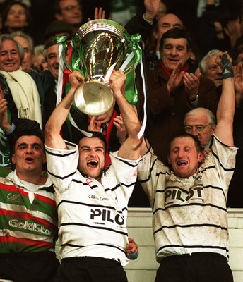 250197 - Leicester Rugby v Brive - Heineken Cup Final - Brive Captain Alain Penaud celebrates with the trophy