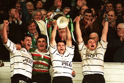 250197 - Leicester Rugby v Brive - Heineken Cup Final - Brive Captain Alain Penaud celebrates with the trophy