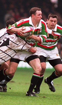 250197 - Leicester Rugby v Brive - Heineken Cup Final - Rob Liley of Leicester is tackled by Loic van der Linden