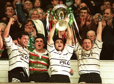 250197 - Leicester Rugby v Brive - Heineken Cup Final - Brive Captain Alain Penaud celebrates with the trophy