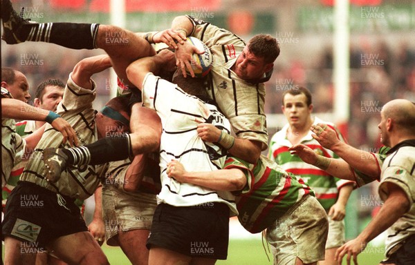 250197 - Leicester Rugby v Brive - Heineken Cup Final - Grant Ross of Brive is upended