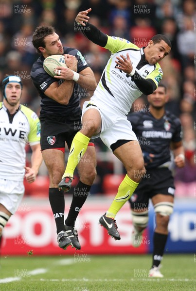 211012 - Leicester Tigers v Ospreys, Heineken Cup - Leicester's Niall Morris and Ospreys Eli Walker compete for the ball