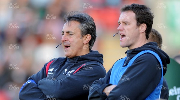 17.10.10 - Leicester Tigers v Llanelli Scarlets - Heineken Cup - Scarlets head coach Nigel Davies(L) and backs coach Mark Jones look on. 