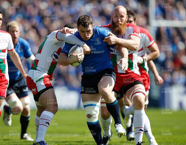 270413 - Leinster v Biarritz - Amlin Challenge Cup - Cian Healy of Leinster is tackled by Erik Lund of Biarritz 