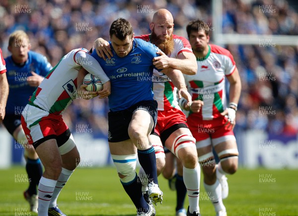 270413 - Leinster v Biarritz - Amlin Challenge Cup - Cian Healy of Leinster is tackled by Erik Lund of Biarritz 