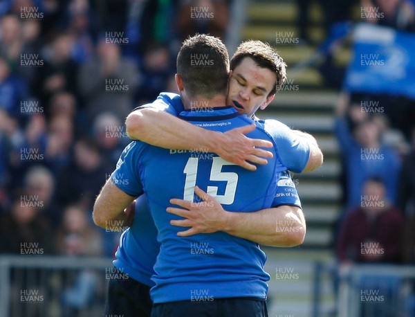 270413 - Leinster v Biarritz - Amlin Challenge Cup - Jonny Sexton of Leinster is congratulated by team-mate Rob Kearney on scoring  