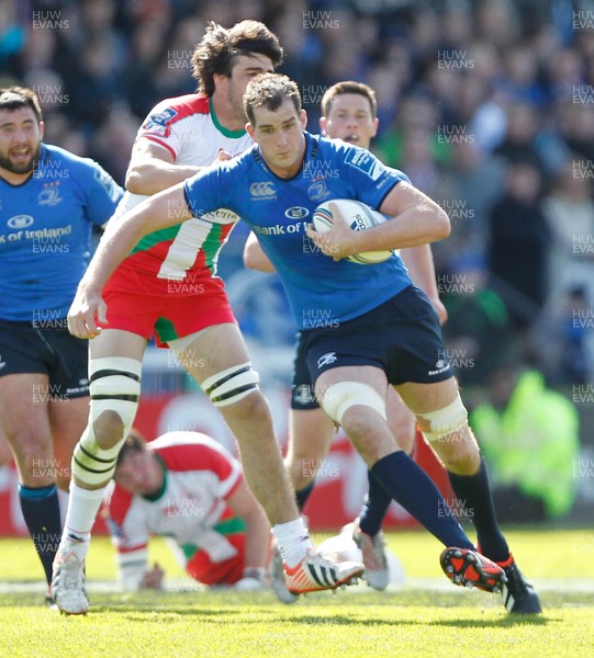 270413 - Leinster v Biarritz - Amlin Challenge Cup - Devin Toner of Leinster takes on Thibault Dubarry of Biarritz 