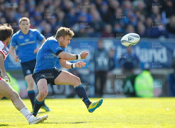 270413 - Leinster v Biarritz - Amlin Challenge Cup - Ian Madiga of Leinster offloads the ball 