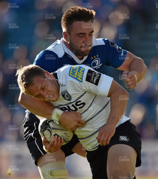 120915 - Leinster v Blues - Guinness Pro 12 - Cardiff Blues' Tom Isaacs is tackled by Jack Conan of Leinster