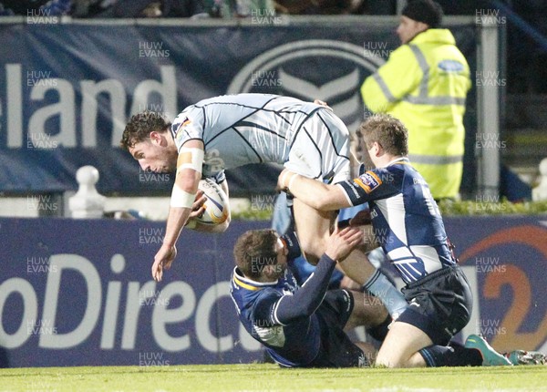 271012 Leinster v Blues - RaboDirect Pro 12 - Alex Cuthbert of Cardiff is tackled by Gordon D'Arcy and David Kearney of Leinster 