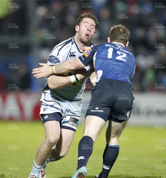 271012 Leinster v Blues - RaboDirect Pro 12 - Alex Cuthbert of Cardiff is tackled by Gordon D'Arcy of Leinster 