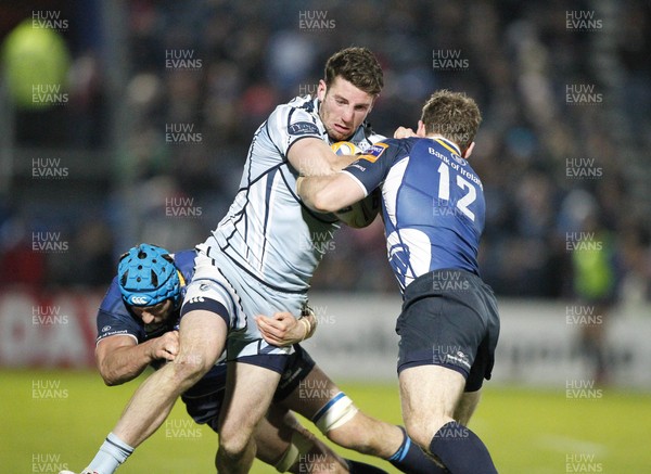 271012 Leinster v Blues - RaboDirect Pro 12 - Alex Cuthbert of Cardiff is tackled by Gordon D'Arcy and Kevin McLaughlin of Leinster 