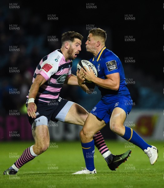 080917 - Leinster v Cardiff Blues - Guinness PRO14 -  Jordan Larmour of Leinster is tackled by Alex Cuthbert of Cardiff 