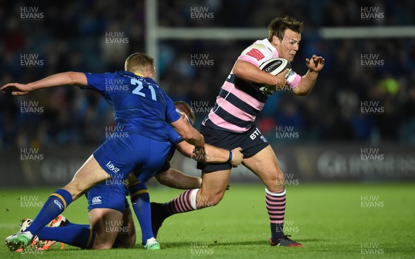 080917 - Leinster v Cardiff Blues - Guinness PRO14 -  Jarrod Evans of Cardiff is tackled by Nick McCarthy and Sean Cronin of Leinster