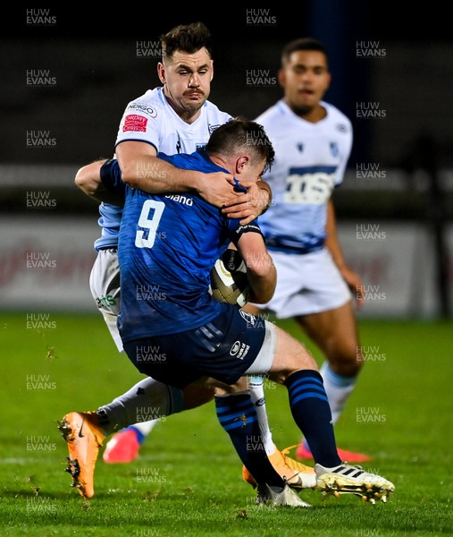 221120 - Leinster v Cardiff Blues - Guinness PRO14 - Tomos Williams of Cardiff Blues tackles Luke McGrath of Leinster