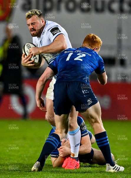 221120 - Leinster v Cardiff Blues - Guinness PRO14 - Owen Lane of Cardiff Blues is tackled by Harry Byrne and Ciaran Frawley of Leinster