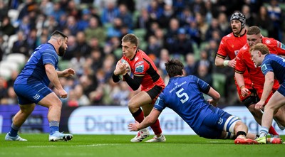 010325 - Leinster v Cardiff Rugby - United Rugby Championship - Cam Winnett of Cardiff in action against Brian Deeny of Leinster