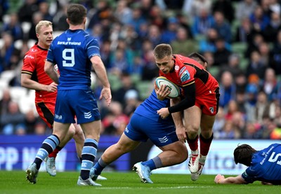 010325 - Leinster v Cardiff Rugby - United Rugby Championship - Cam Winnett of Cardiff in action against Rabah Slimani of Leinster