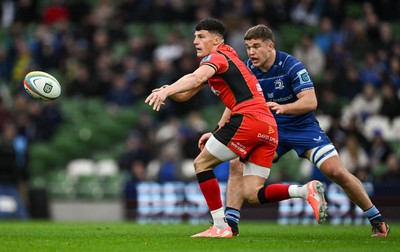 010325 - Leinster v Cardiff Rugby - United Rugby Championship - Ellis Bevan of Cardiff in action against Scott Penny of Leinster