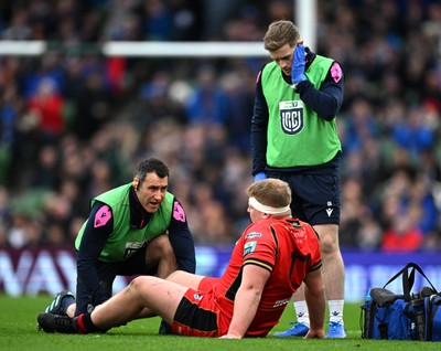 010325 - Leinster v Cardiff Rugby - United Rugby Championship - Rhys Barratt of Cardiff receives medical attention