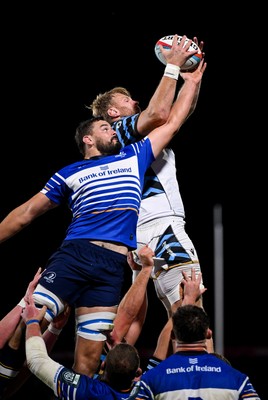 101026 - Leinster v Cardiff Rugby - United Rugby Championship - Max Deegan of Leinster in action against Josh McNally of Cardiff