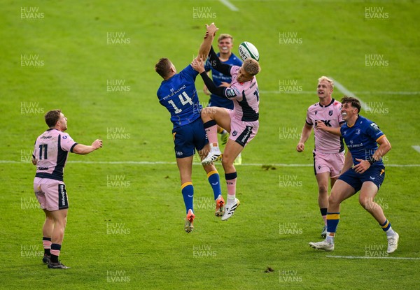 130925 - Leinster v Cardiff Rugby - Preseason Friendly - Jordan Larmour of Leinster and Cam Winnett of Cardiff Rugby contest a high ball