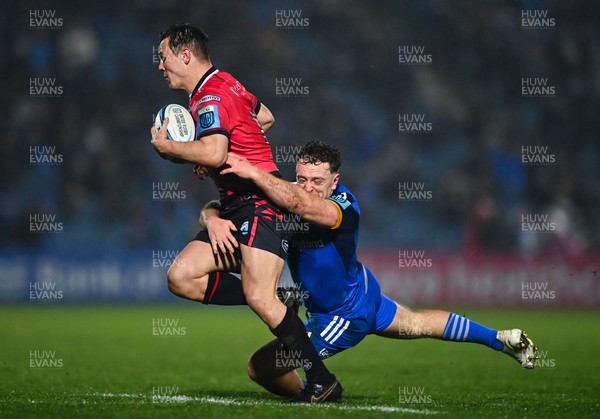 280123 - Leinster v Cardiff Rugby - United Rugby Championship - Jarrod Evans of Cardiff in action against Liam Turner of Leinster