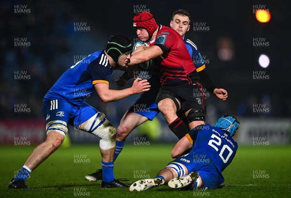 280123 - Leinster v Cardiff Rugby - United Rugby Championship - James Botham of Cardiff is tackled by Leinster players, from left, James Culhane, Nick McCarthy and Will Connors