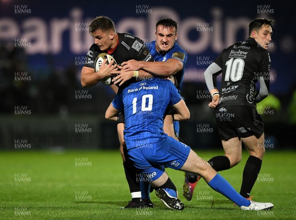 011119 - Leinster v Dragons - Guinness PRO14 -  Connor Edwards of Dragons is tackled by Harry Byrne and Ronan Kelleher of Leinster