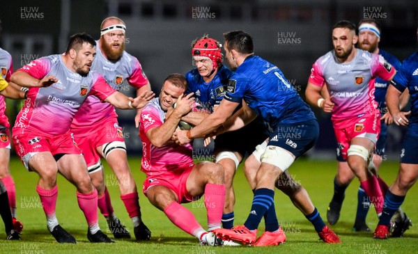 021020 - Leinster v Dragons - Guinness PRO14 - Jamie Roberts of Dragons is tackled by Josh van der Flier and Jack Conan of Leinster