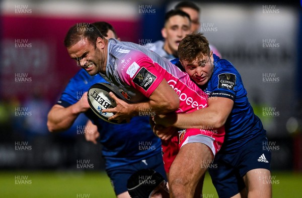 021020 - Leinster v Dragons - Guinness PRO14 - Jamie Roberts of Dragons is tackled by Jordan Larmour of Leinster