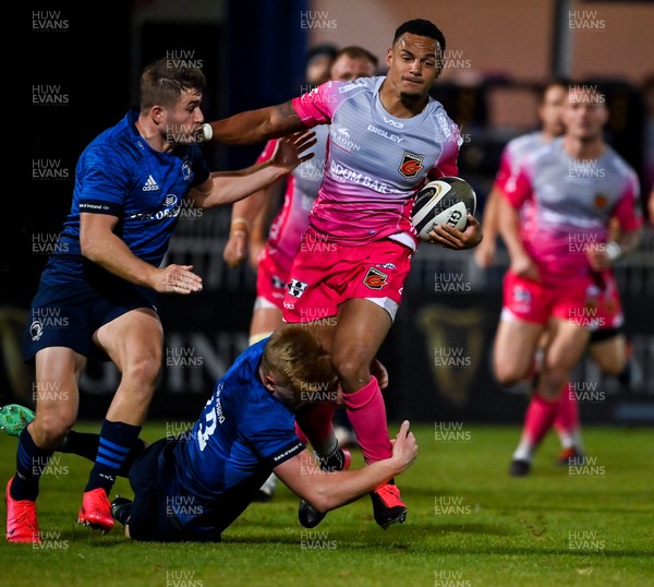 021020 - Leinster v Dragons - Guinness PRO14 - Ashton Hewitt of Dragons is tackled by Jordan Larmour and Tommy O'Brien of Leinster