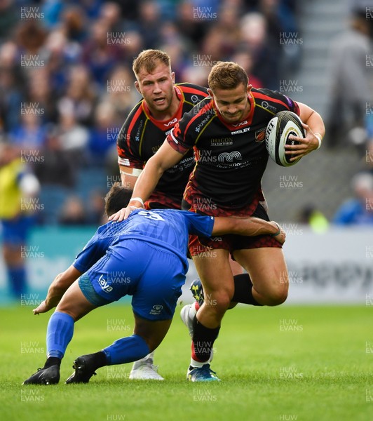 150918 - Leinster v Dragons - Guinness PRO14 -  Hallam Amos of Dragons is tackled by Jamison Gibson-Park of Leinster