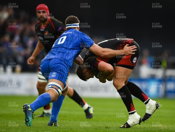 150918 - Leinster v Dragons - Guinness PRO14 -  Lloyd Fairbrother of Dragons is tackled by Caelan Doris of Leinster