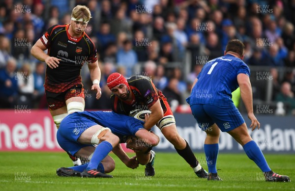 150918 - Leinster v Dragons - Guinness PRO14 -  Cory Hill of Dragons is tackled by Ed Byrne of Leinster