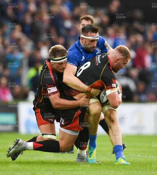 150918 - Leinster v Dragons - Guinness PRO14 -  Ross Moriarty of Dragons is tackled by Jack Conan of Leinster