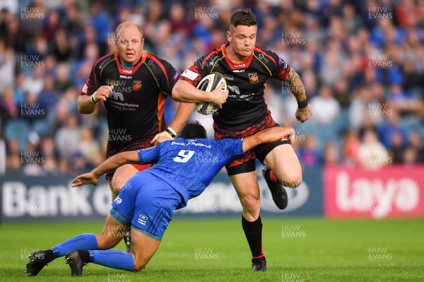 150918 - Leinster v Dragons - Guinness PRO14 -  Tavis Knoyle of Dragons is tackled by Jamison Gibson-Park of Leinster