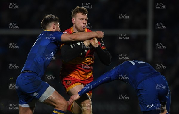 241117 - Leinster v Dragons - Guinness PRO14 -   Jack Dixon of Dragons is tackled by Ross Byrne, left and Rory O'Loughlin of Leinster