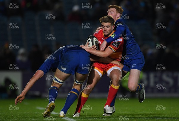 241117 - Leinster v Dragons - Guinness PRO14 -   Arwel Robson of Dragons is tackled by Max Deegan, left and Cathal Marsh of Leinster