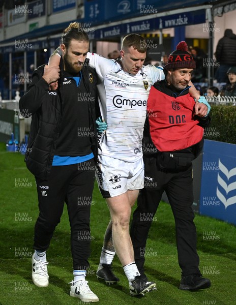 180223 - Leinster v Dragons RFC - United Rugby Championship - Jack Dixon of Dragons leaves the field with an injury