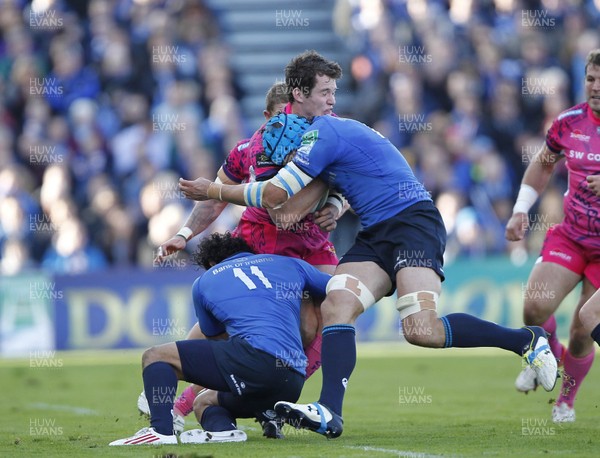 131012 Leinster v Exeter - Heineken Cup - Ian Whitten of Exeter is tackled by Isa Nacewa and Kevin McLaughlin of Leinster 