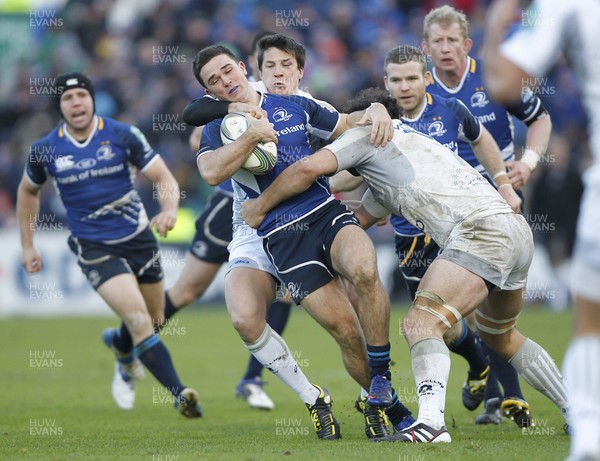 21.01.12 - Leinster v Montpellier - Heineken Cup Eoin O'Malley of Leinster tackled by Francois Trinh-Duc and Agustin Creevy of Montpellier  