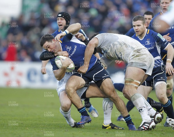 21.01.12 - Leinster v Montpellier - Heineken Cup Eoin O'Malley of Leinster tackled by Francois Trinh-Duc and Agustin Creevy of Montpellier  