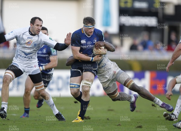 21.01.12 - Leinster v Montpellier - Heineken Cup Jamie Heaslip of Leinster tackled by Montpellier's Vasili Bost and Fulgence Ouedraogo 