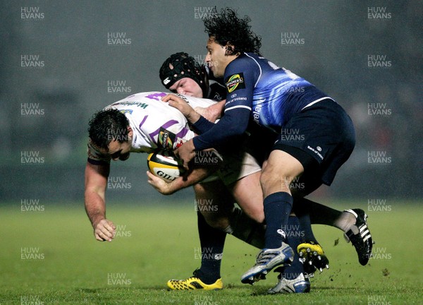 07.01.11 - Leinster v Ospreys - Magners League - Leinster's Richardt Strauss and Isa Nacewa with Sonny Parker of Ospreys. 