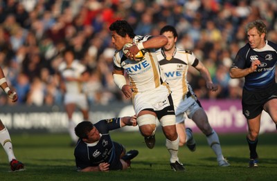 16.04.10 Leinster v Ospreys... Filo Tiatia of Ospreys evades the tackle of John Fogarty of Leinster. 