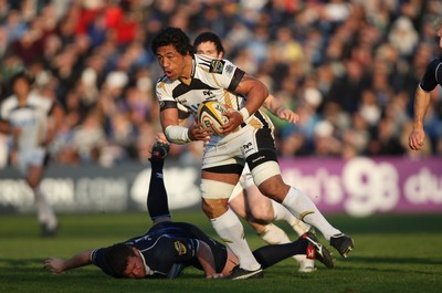 16.04.10 Leinster v Ospreys... Filo Tiatia of Ospreys evades the tackle of John Fogarty of Leinster. 